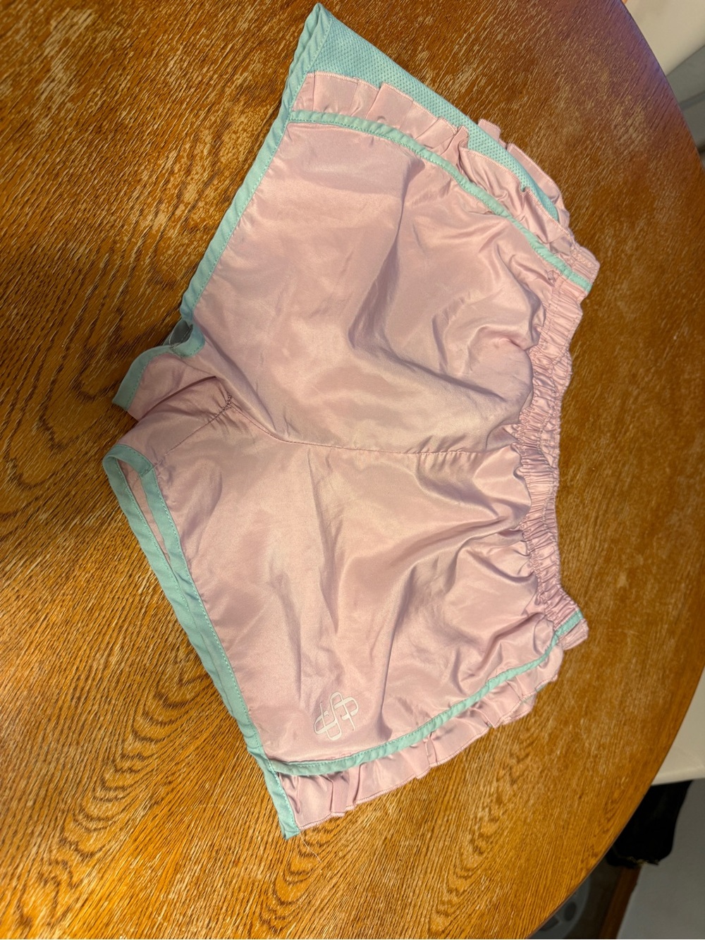 Women’s Pink Ruffle Trim Athletic Shorts